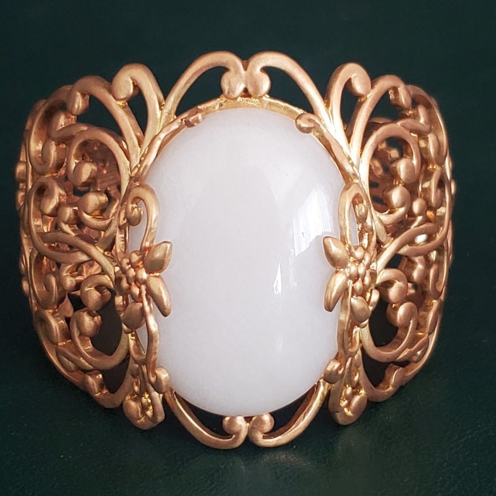 Glow by Sheila Fajl Gold Tone Filigree White Cabochon Cuff Bracelet Statement